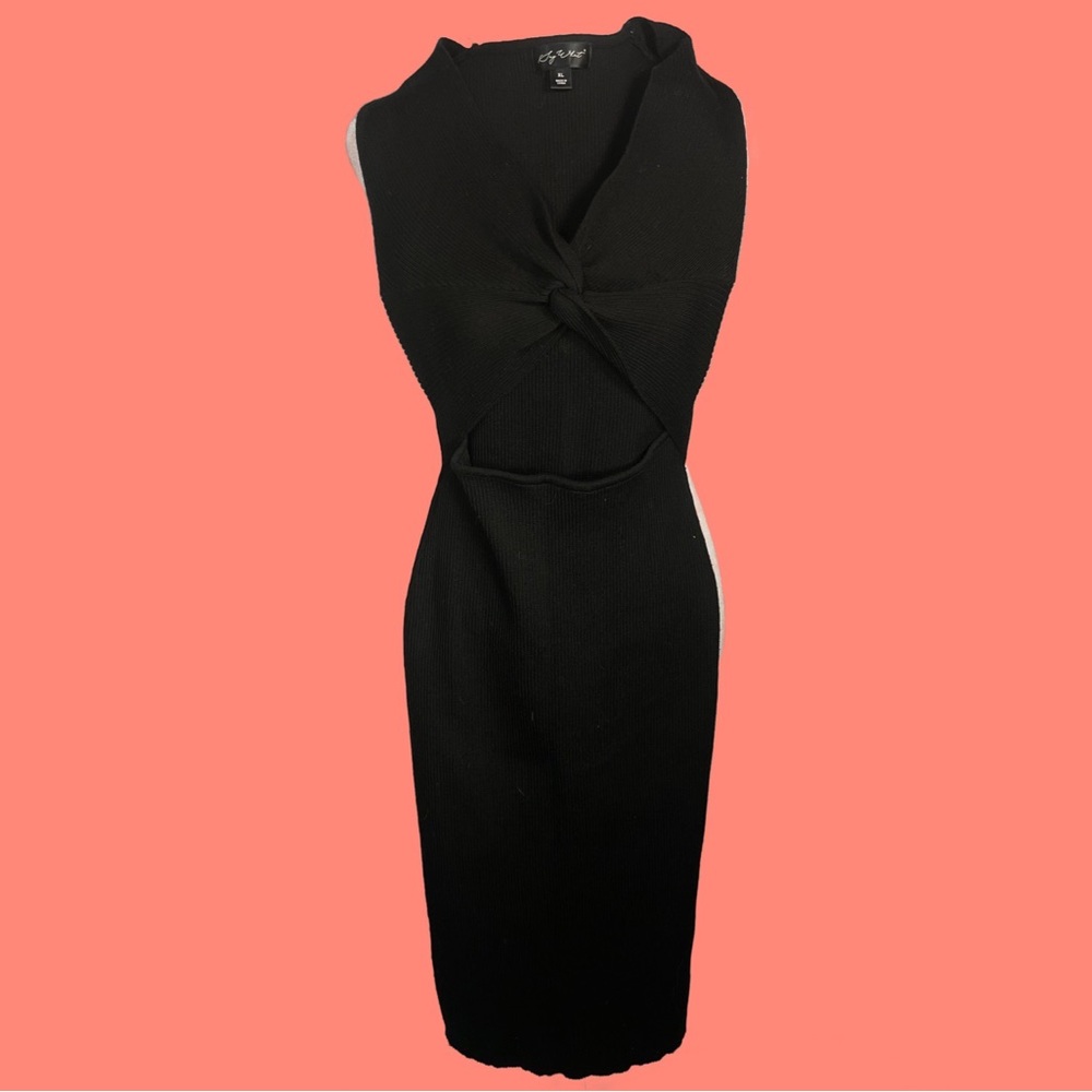Sexy black maxi dress with an opening at the waist and a tied knot top